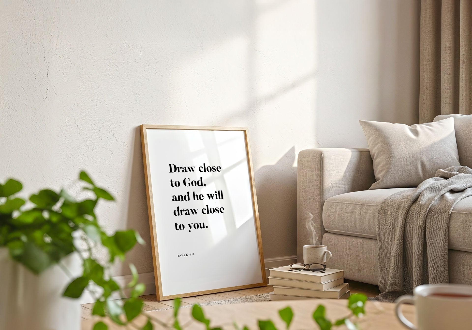 Living room with a framed quote on the wall, a couch, and a plant.